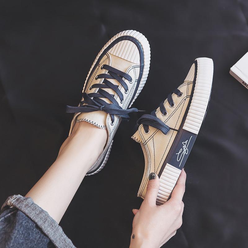 Biscuit shoes women's half-drag canvas shoes new versatile lazy shoes one pedal no heel white shoes tide