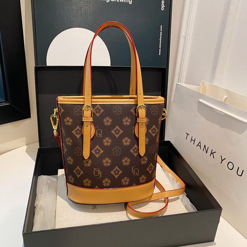 Bucket bag women's new retro simple niche high-end women's handbag diagonal span small women's bag