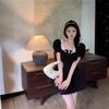French high-end Hepburn style daughter feeling small black dress women's summer niche square neck bow bubble sleeve dress