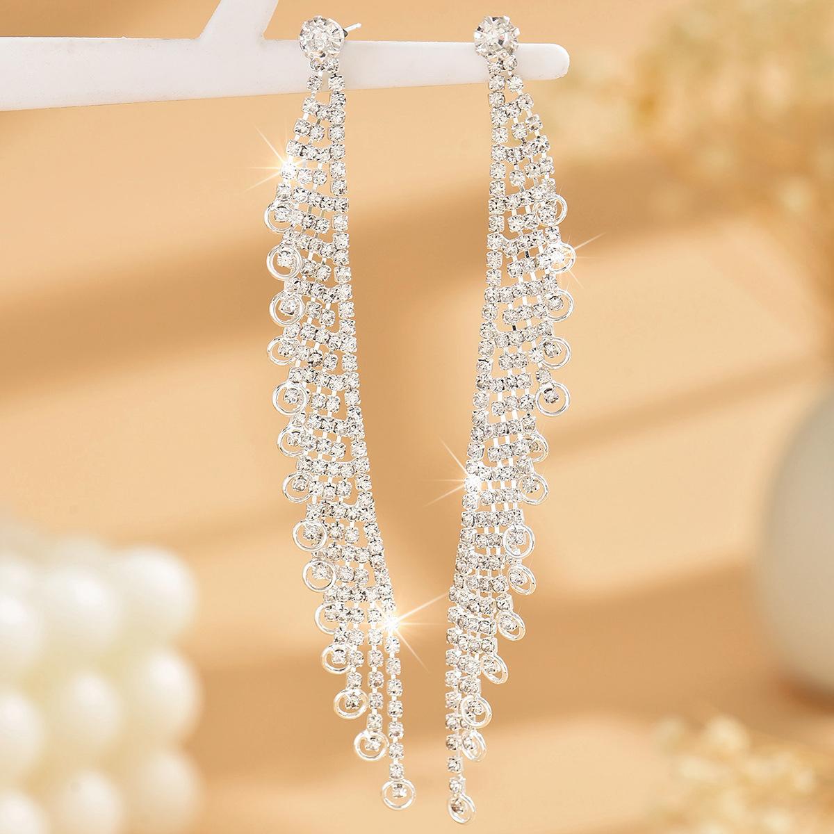Преувеличенный темперамент ювелирных изделий Супер вспышка Полный бриллиант Дуга Длинные серьги Женская мода Высококлассные серьги-гвоздики