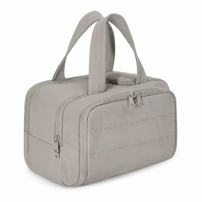 Lightweight Wide-Opening Handheld Makeup Bag – Stylish and Puffy Cosmetic Storage