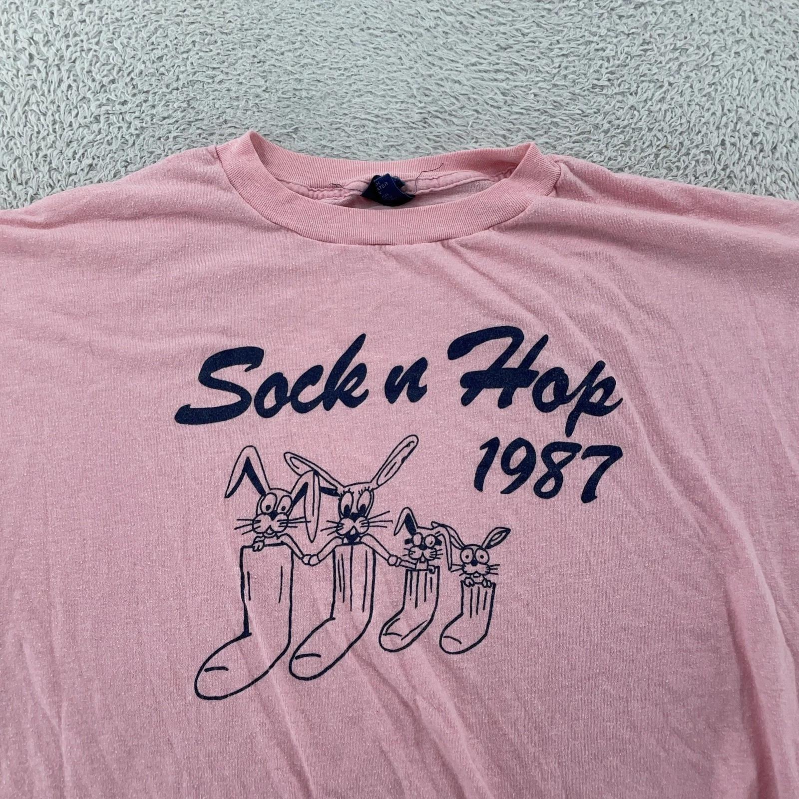 

Vintage 80s Sock n Hop 1987 Bunnies T Shirt Mens FITS S Pink Cartoon Rock USA 2XL