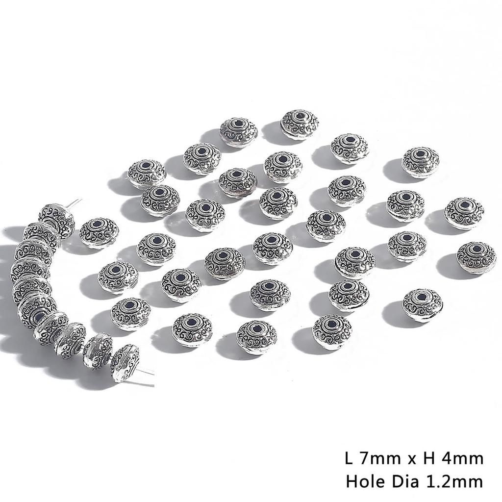 30–50 stk. avstandsperler i antikk metall med kjeglemønster til smykkelaging