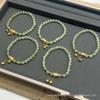 Two Lives Joy S925 Sterling Silver Gold-Plated Bracelet with Rotating Lotus & Hetian Jade - Elegant Gift for Girlfriend