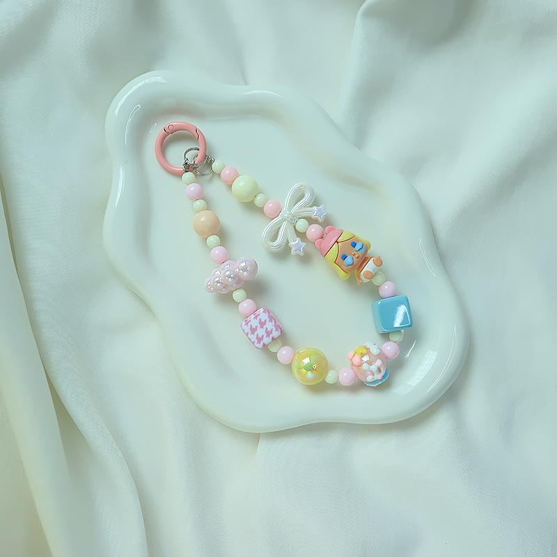 Roztomilá kreslená panenka s korálkovým popruhem na telefon, řetízkem na batoh, přívěskem na klíče, přívěskem proti ztracenému telefonu, dárkem pro iPhone, Samsung a dívku