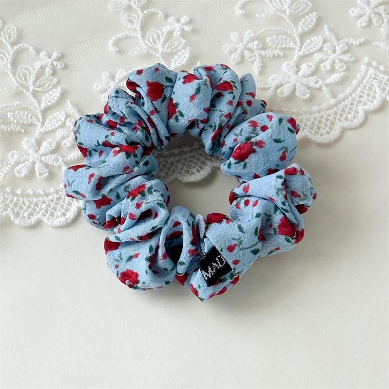 Fresh and Light Floral Fabric Hair Band for Loose Braided Hairstyle in Summer - A Stylish Ponytail Hair Accessory Made of Elastic Band.