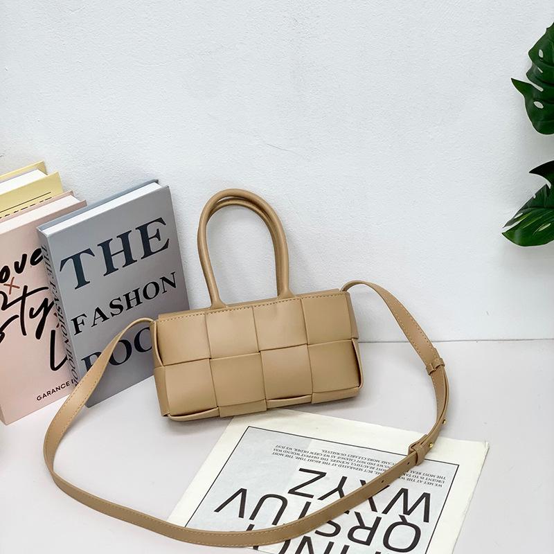 2024 Early spring new leather woven vegetable basket bag women's hand shoulder messenger bag small mini versatile