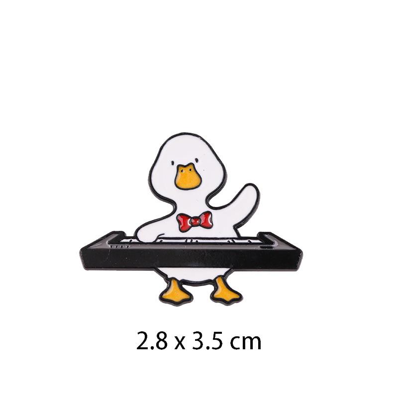 Cute Musician Duck Enamel Brooch Creative Cartoon Violin Piano Baton Guitar Animals Lapel Pins Backpack Jewelry Gifts For Kids