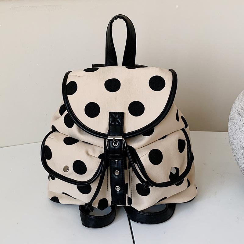 Cartable exquis super feu niche sac à dos pour femme 1011 nouveau polyvalent pour le trajet sac à dos à pois sac de voyage