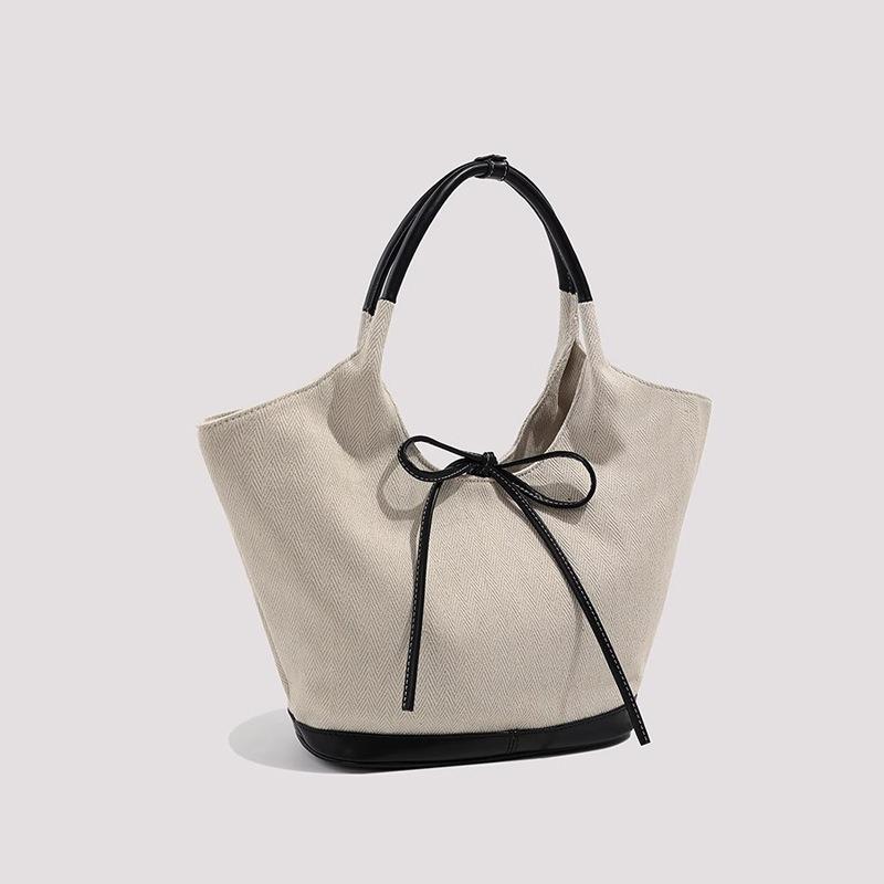 Niche canvas tote bag bow splicing simple commuting shoulder bag casual portable big bag tide