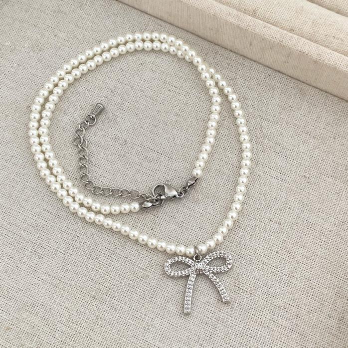 

Новое корейское ожерелье-бант в стиле Дондэмун 2024 года с кубическим цирконием и жемчугом