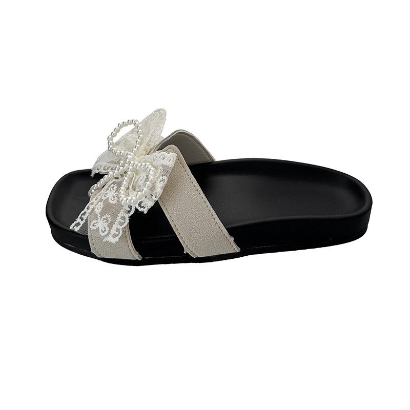Sweet lace bow one-word female summer flat bottom cool slippers light and comfortable outer wear casual Korean version cool slippers