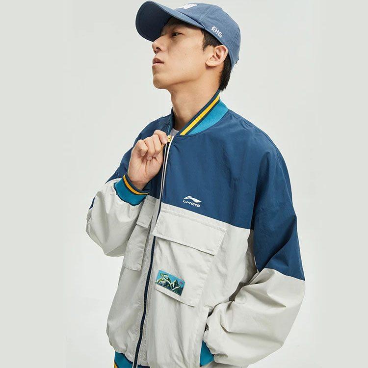 Li Ning Sports Trendige Kollektion Jacke Herbst Unisex Tiefes Wasser Entenblau Antarktisches Grau Mehrfarbig AJDR383-3