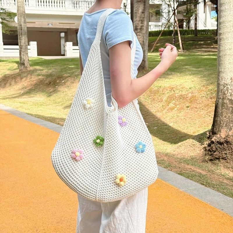 Beach bag single shoulder tote bag women's hollow new Korean version knitted woven bag flower lazy wind