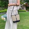 Cowhide canvas splicing bucket bag women's 2025 summer shoulder oblique span bag casual versatile underarm bag Korean version tide