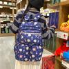 Stylish small fresh printed student backpack trendy cute lightweight backpack junior high school large capacity schoolbag