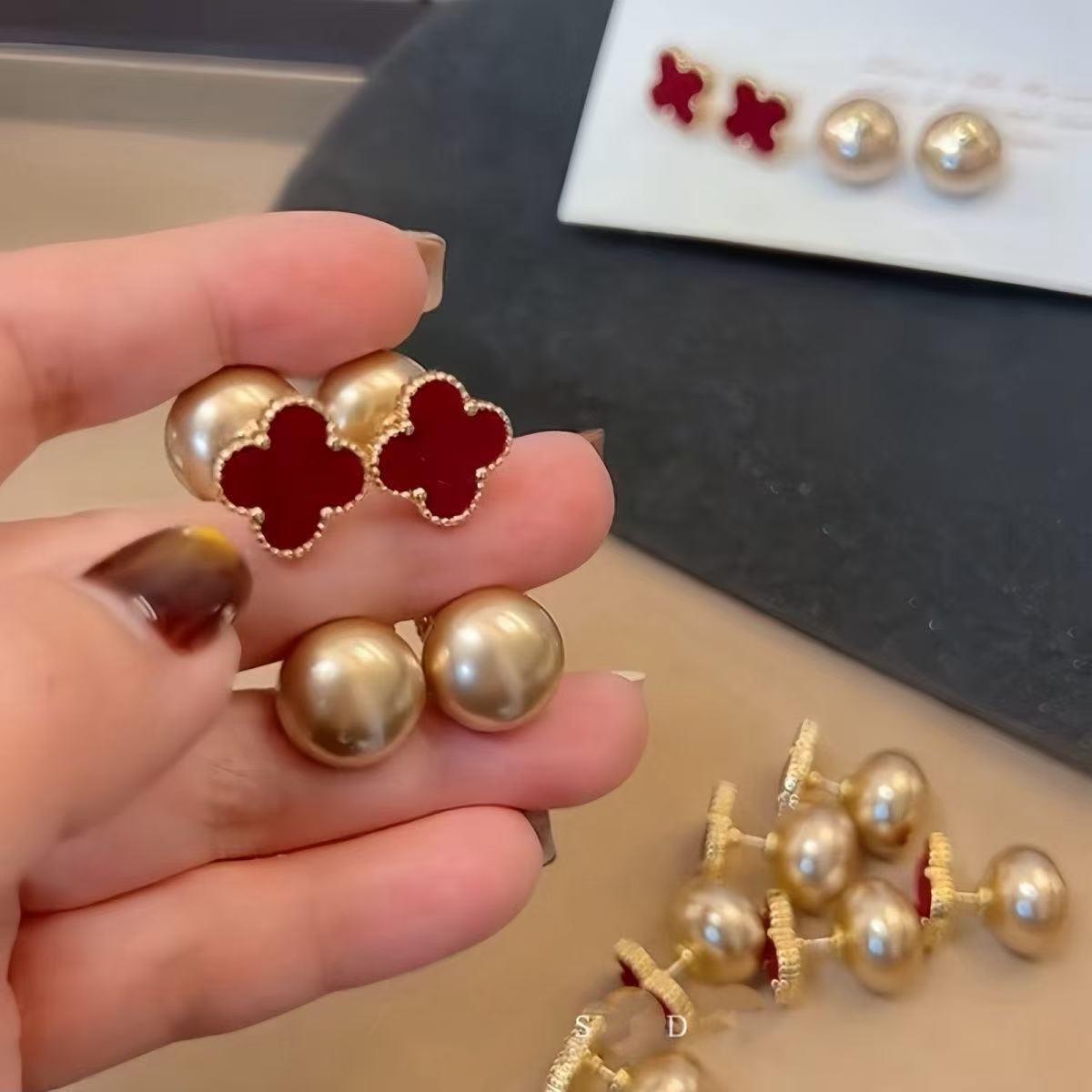 Hong Kong Retro Wine Red Clover Stud Earrings - Unique & Stylish Design