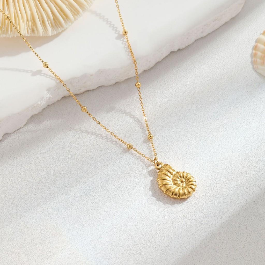 

Ocean Trendy Inspired Gold Plated Stainless Steel Necklace Featuring Seashell And Starfish Accents Ideal For Fashionable Com 18K Gold Conch