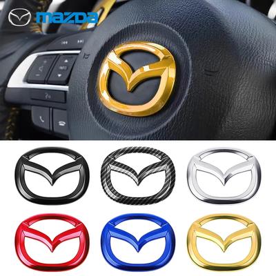 Fém Autó Kormánykerék Közép Embléma Matrica Mazda Axela 323 CX5 CX3 CX6 RX7 MX5 CX9 CX7 CX9 Emblémákhoz Belső Dekoráció