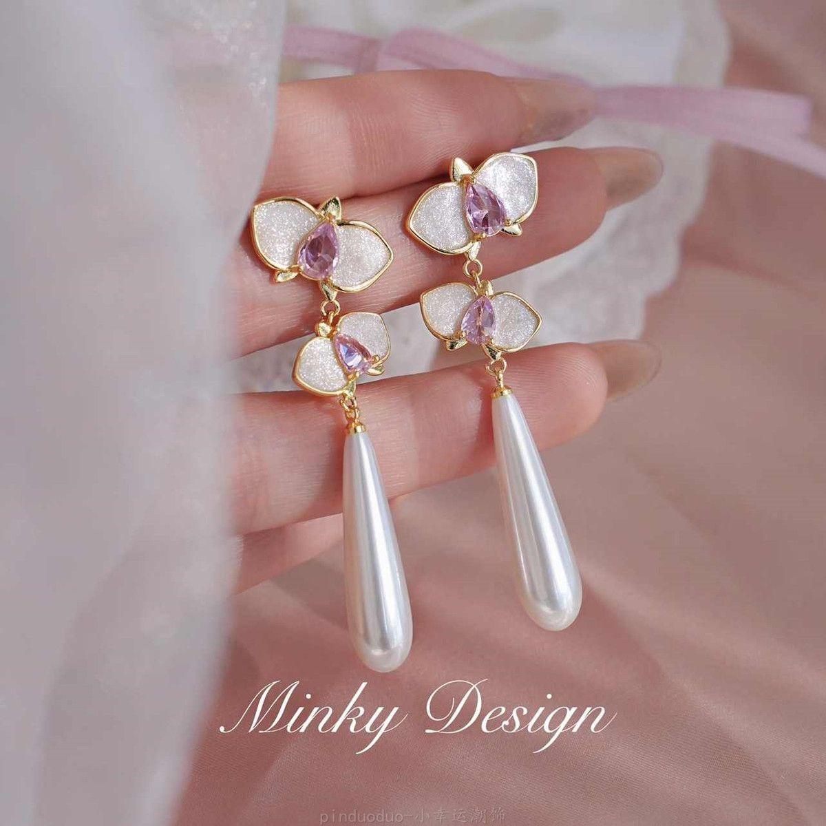 Retro long new Chinese elegant pearl flower earrings mosquito coil disc earclips without earrings
