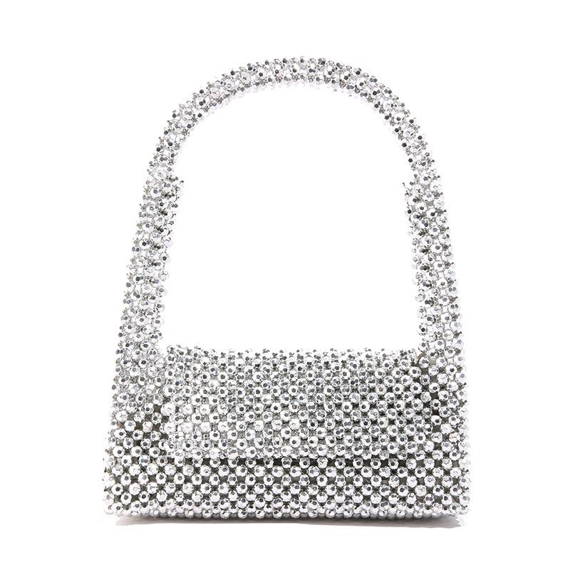 

Internet celebrity armpit bag 2025 new European and American fashion niche shoulder bag women versatile acrylic beaded woven bag срібний