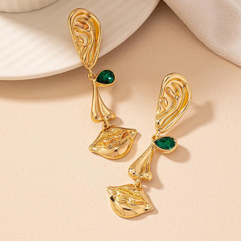 Retro Metal Face Earrings: Unique Design, Bold Style, Exaggerated Look for Women.