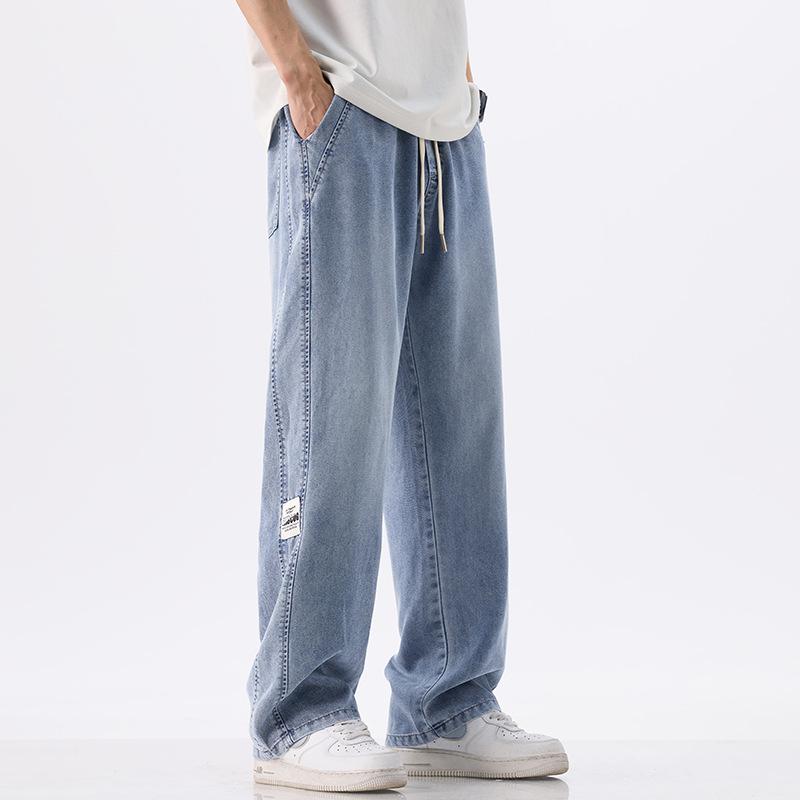 

Летние тонкие джинсы мужские эластичная талия свободные универсальные широкие брюки 5XL синий