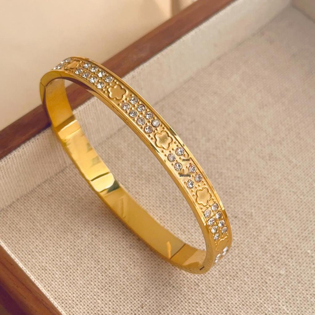 Luxusní dámský náramek z titanové oceli se zirkony a akcenty z bílé perleti