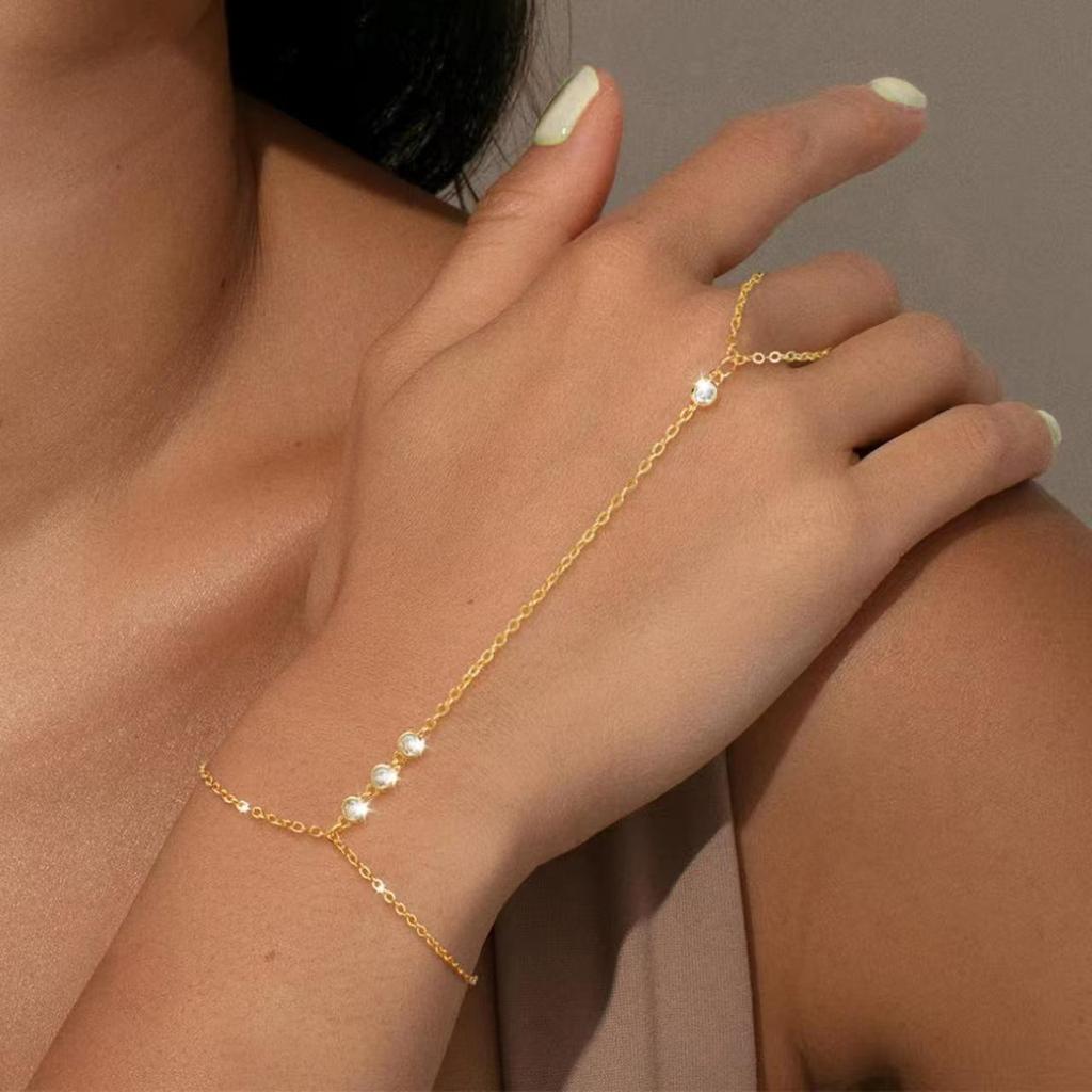Elegancka Bransoletka z Łańcuszka Krzyżowego z Łącznikiem Łańcuszka na Palec: Europejski i Amerykański Design Zimnych Ust, Biżuteria na Palce-Dłonie ze Stopu