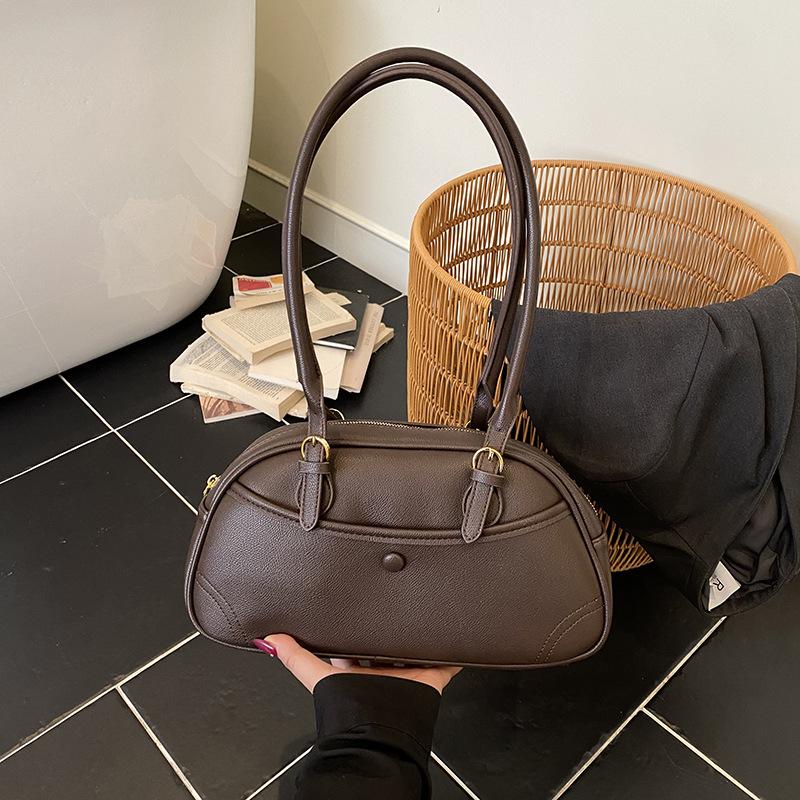 

Fashion large-capacity bag women s 2025 new commuter versatile shoulder underarm bag portable pillow bag Boston bag темно-коричневого