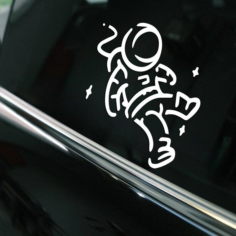 THE  falling Cute little spaceman stickers .Add a Touch of Space Magic to Your Car with Stylish Car Accessories.