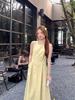 Send a small backpack, design jewelry, pure and gentle yellow dress, women's summer round neck waist and thin a-word long dress
