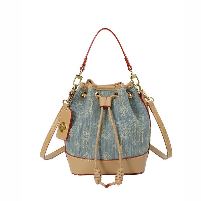 New versatile retro bucket bag New women's bag Fashion and high-end portable shoulder bag Crossbody bag