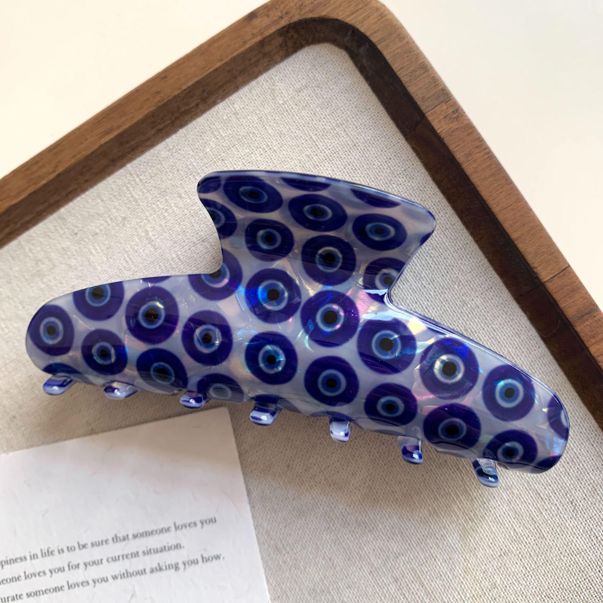 

2025 Ghostly Blue Devil s Eye PVC Hair Clip - Large Claw with Ice Blue Eye Design