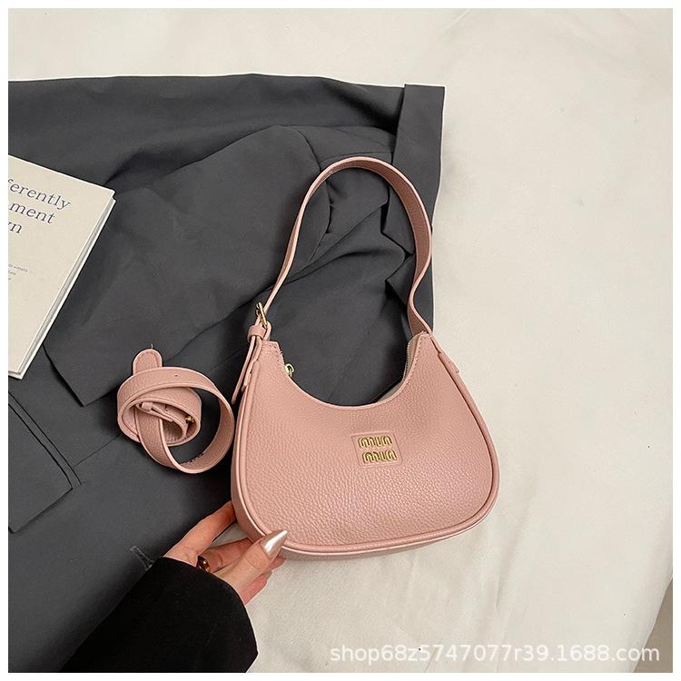 

Niche foreign-style crescent moon bag women s bag 2025 new high-end shoulder underarm bag versatile large-capacity commuter bag розовый