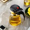 Elegant Heat-Resistant Glass Tea Infuser Pot with One-Button Filtering - Customizable with Logo Option.