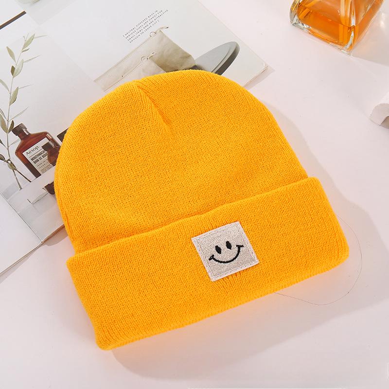 Children's Smiling Face Hats In Stock Children's Candy Colored Knitted Hats with Embroidery Cold Hats for Boys Girls Smiling Face Logo Yarn Hats