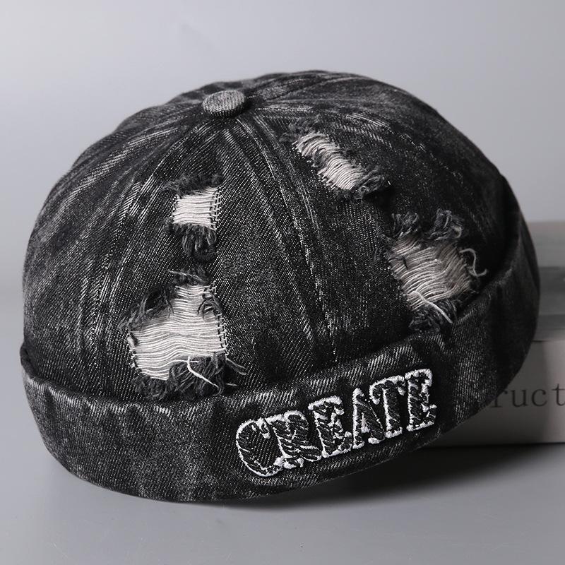 Europäische und amerikanische Stickbuchstaben zerrissene Jeans Melonenmütze Herren und Damen Paare Modetrend lässig vielseitig Vermieterhut