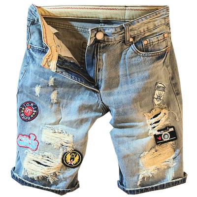 Pantaloncini di jeans con stampa di lettere da uomo estivi Pantaloncini di jeans con fori casuali Etichetta ricamata Pantaloni di jeans medi a 5 punti Pantaloncini di moda maschile
