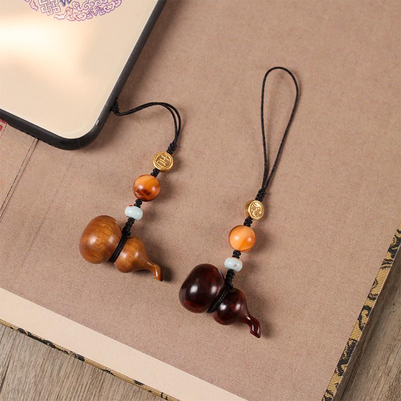 Creative Chinese-style high-end sandalwood small gourd phone chain pendant U Pendant for hanging on a bag, suitable for couples