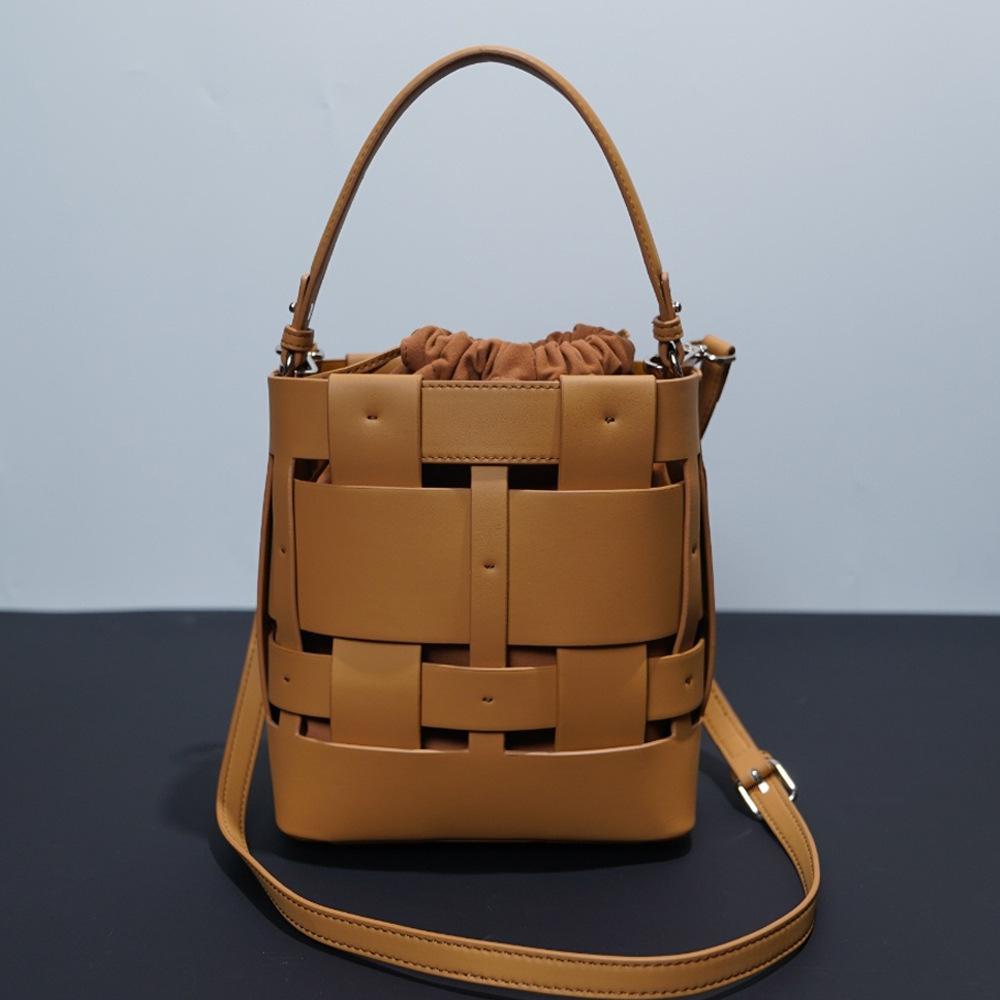 Genuine leather niche hollow design European and American fashion versatile woven handbag cowhide shoulder bag bucket bag crossbody