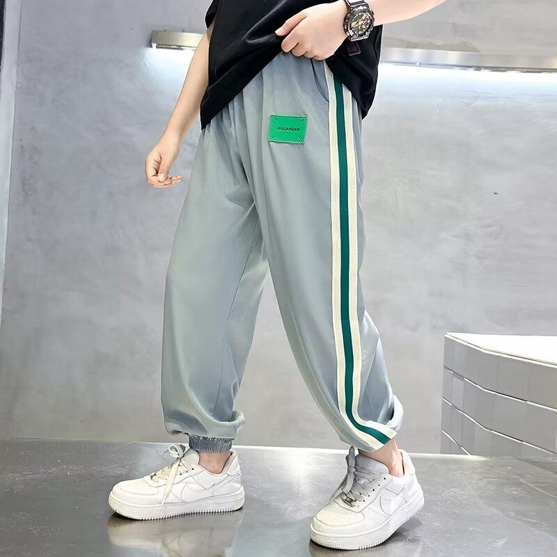 

Детские брюки от комаров Летние тонкие брюки для мальчиков 2025 Новый стиль Летние спортивные брюки для больших детей Брюки из ледяного шелка с быстрой сушкой 170 серый