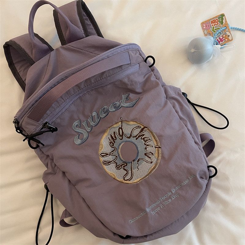 

Backpack Women s Schoolbag 2024 New Arrival Female College Student Travel Lightweight and Large Capacity Travel Small Backpack Purple casual backpack