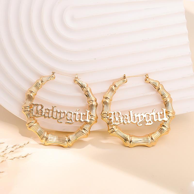 European and American fashion hollow letter mix and match punk earrings women's temperament bamboo ring personality retro stud earrings