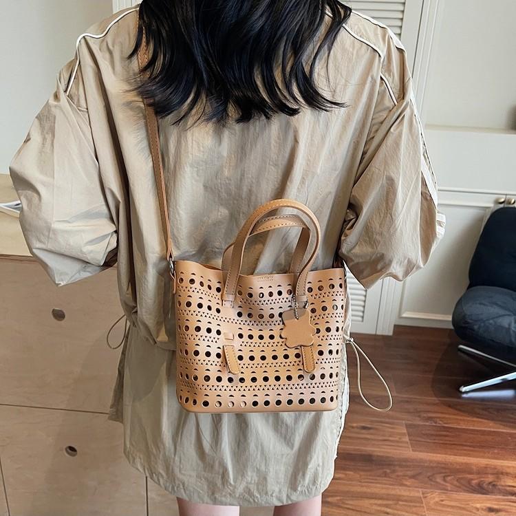 Popular small bag women's summer new versatile hollow messenger bag portable bucket bag