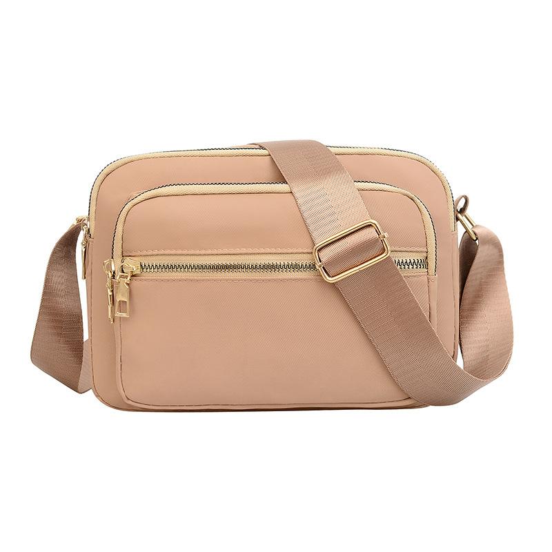 New Oxford cloth bag women's bag lightweight anti-splashing shoulder messenger bag mother bag mobile phone change cashier bag