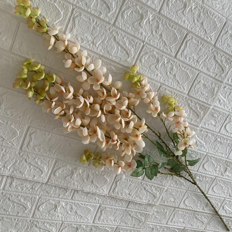 

Silk Artificial Wisteria Flowers For Wedding Venue Wall And Ceiling Design Gift Champagne