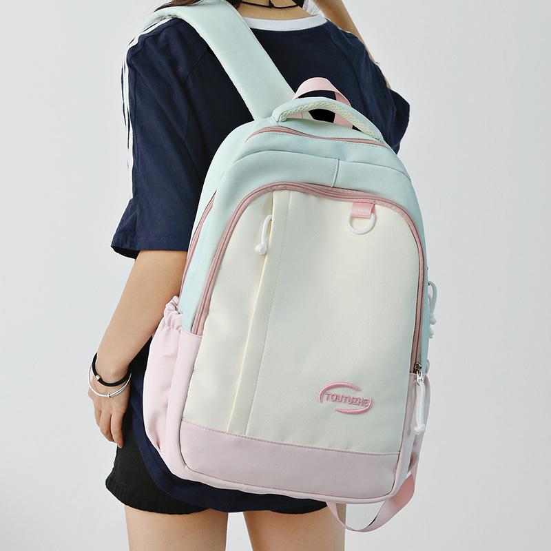 Fresh and high-value backpack girls 2025 new large-capacity junior and high school student schoolbag contrasting color fashionable backpack