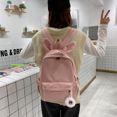Nova Mochila Escolar de Nylon Cor Sólida para Estudantes Homens e Mulheres Orelhas de Coelho Fofas Mochila Fofa