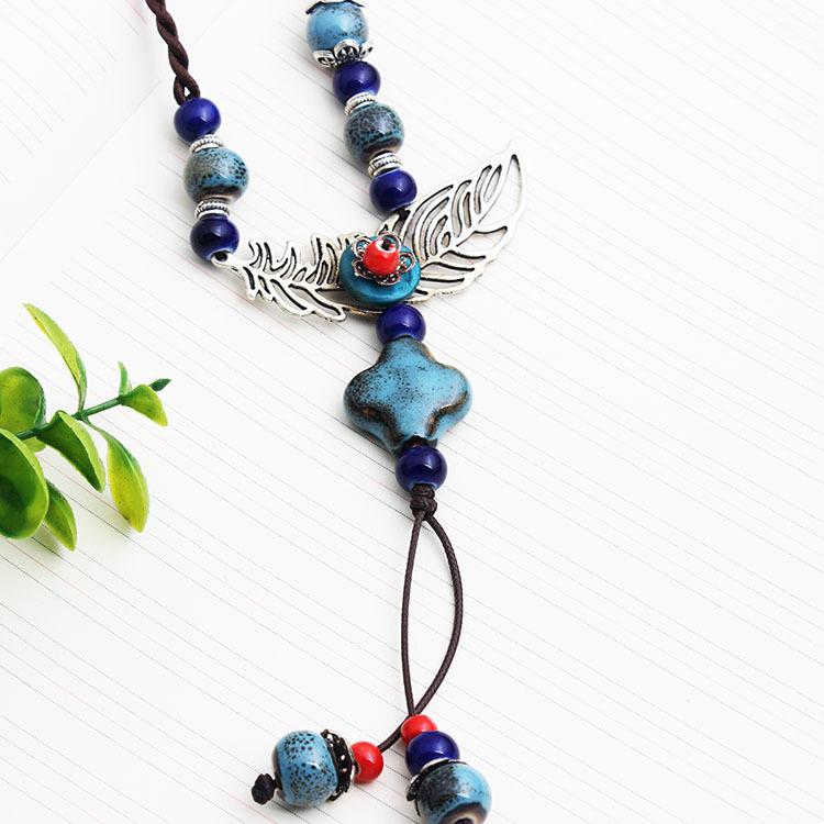 Originálny etnický štýl Všestranné odevné doplnky Kvetinový prívesok Temperament Dlhý náhrdelník Retro prívesok sveter Retiazka jeseň a zima